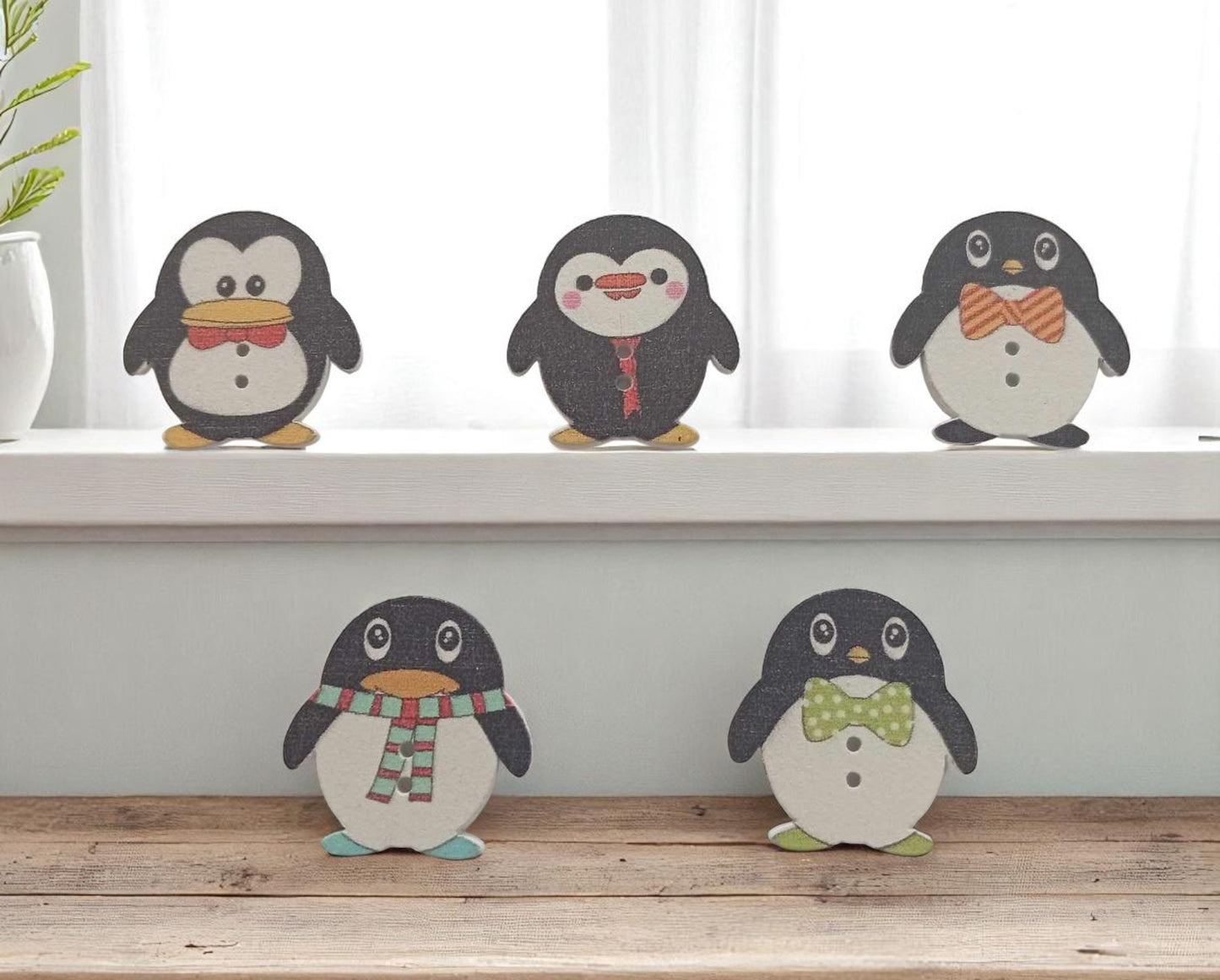 Boutons Pingouins